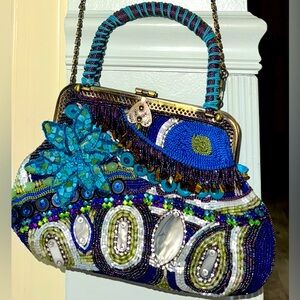Detailed blue beaded flower and stones cross body/double handled ,shoulder bag.